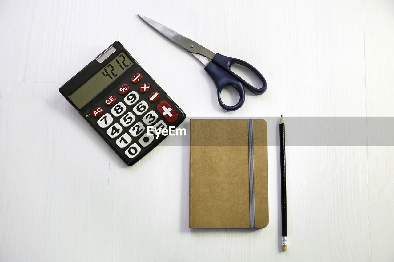 High angle view of studying equipment on table