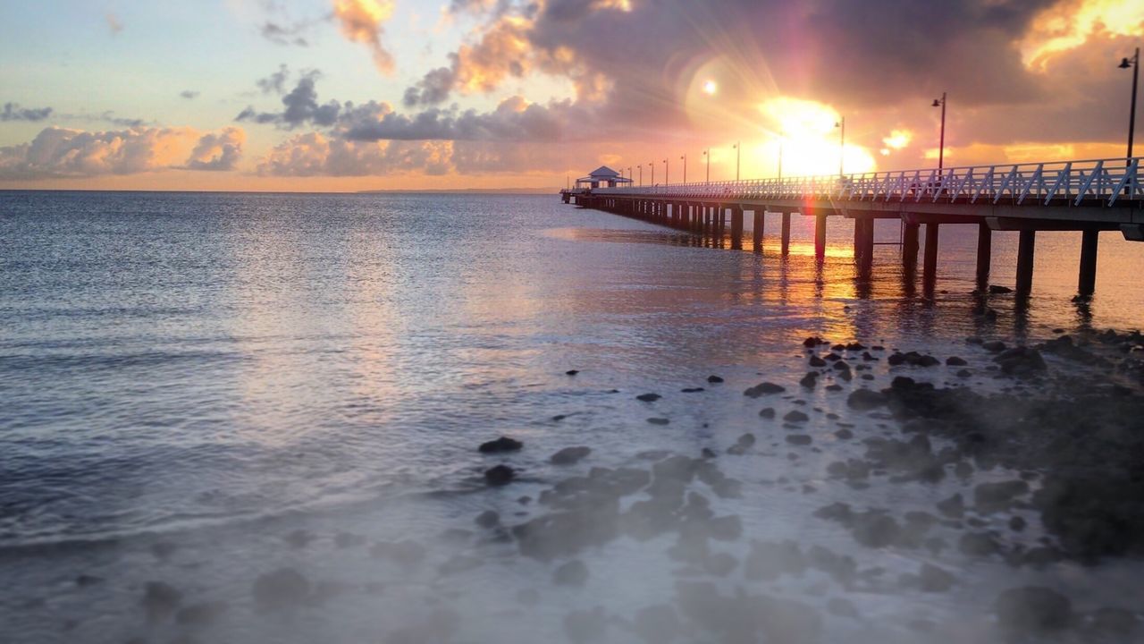 Scenic view of sea at sunset