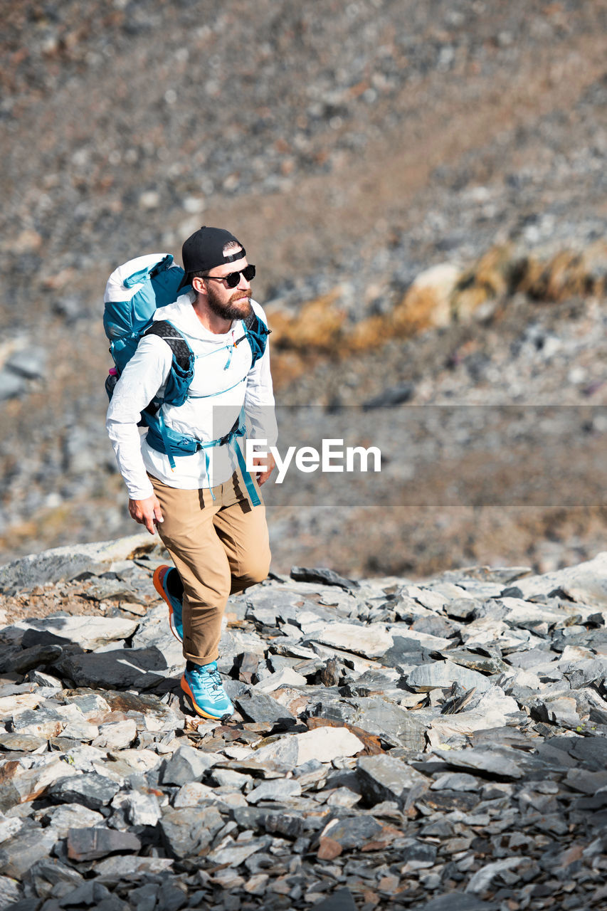 Man on alpine ridge of the italian alps