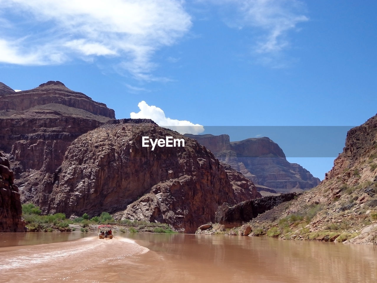 Scenic view of rock formations against sky