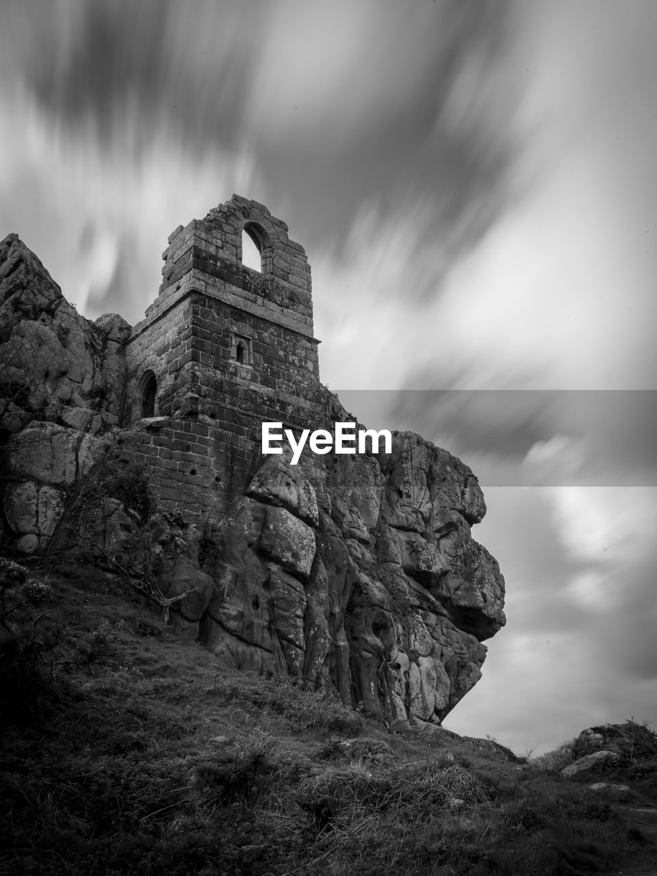 Low angle view of old ruin building against sky