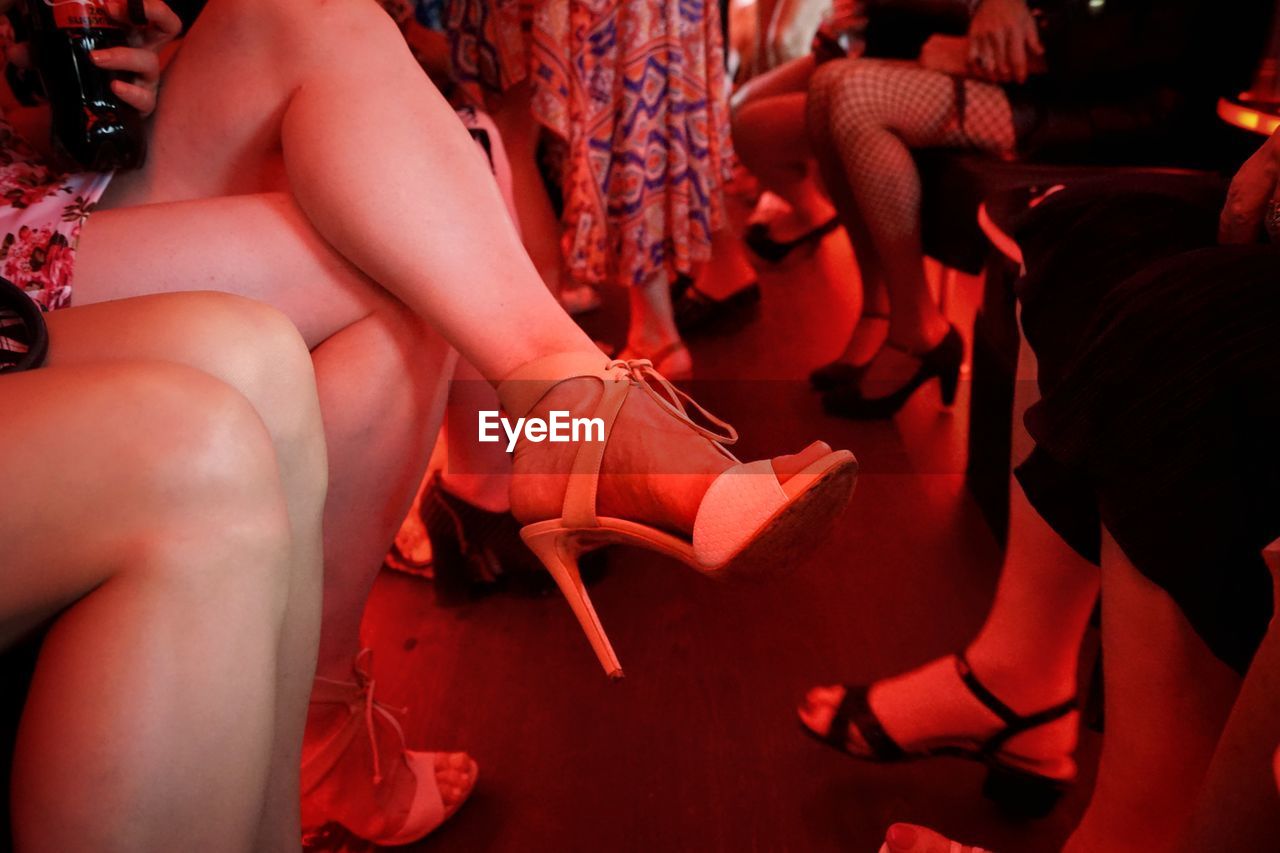Low section of women at party