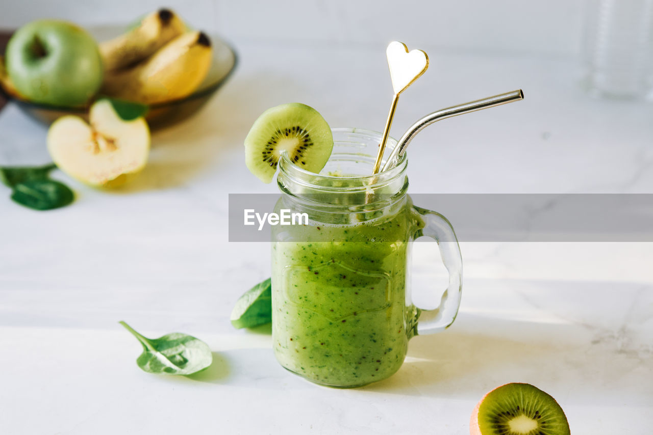 Vegan drink, detox diet smoothie of green fruits, vegetables