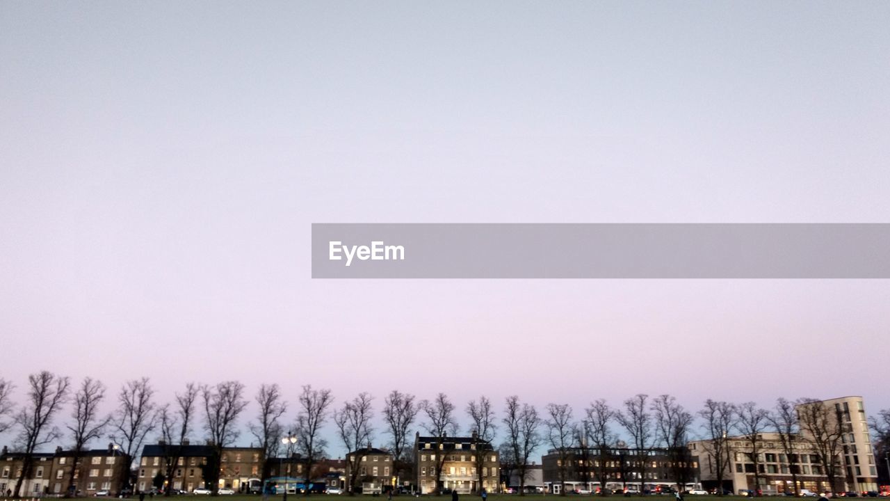 PANORAMIC VIEW OF BUILT STRUCTURES AGAINST SKY