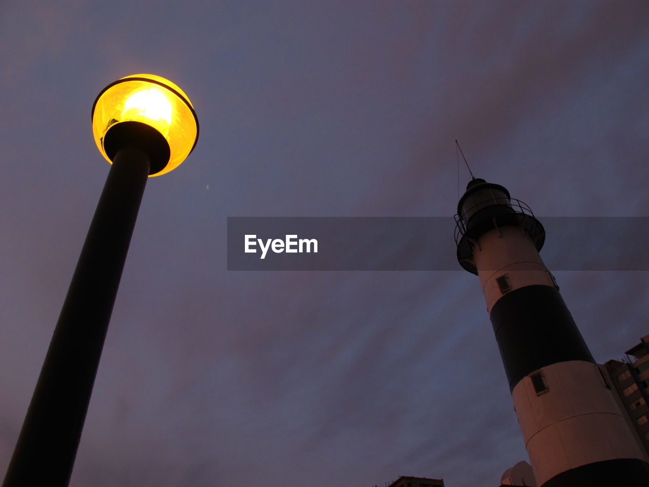 LOW ANGLE VIEW OF STREET LIGHT AGAINST SKY