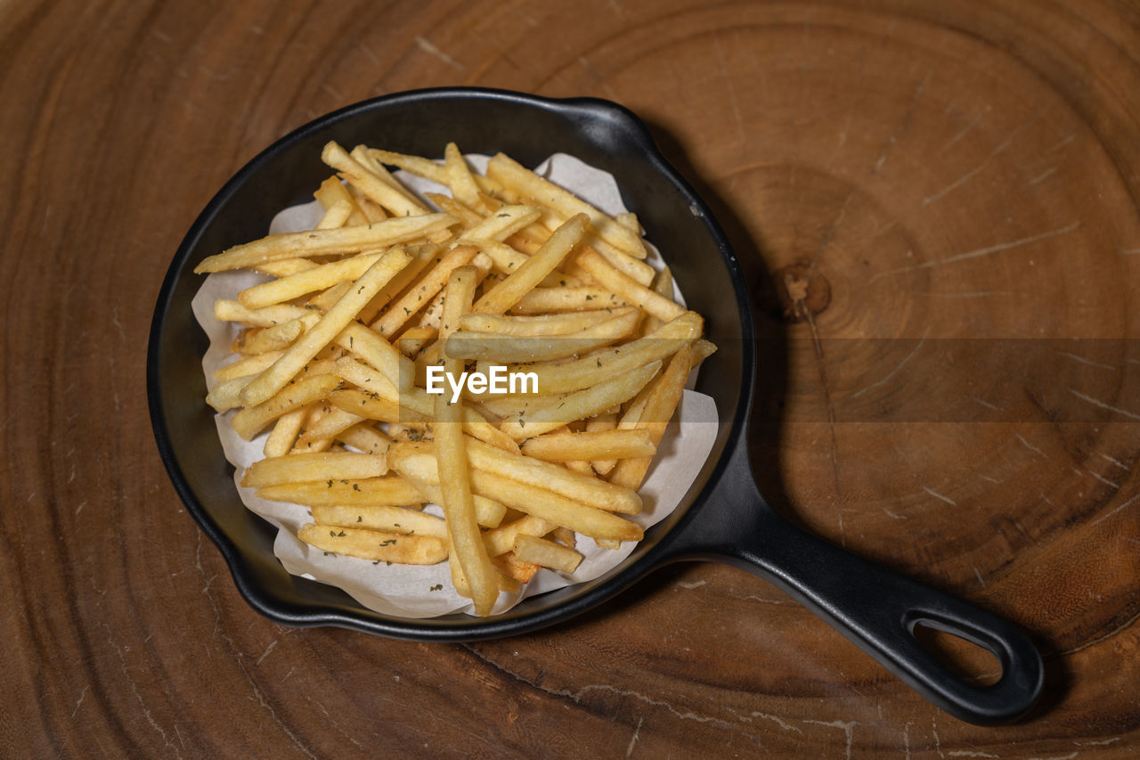 French fries high angle view of food on table
