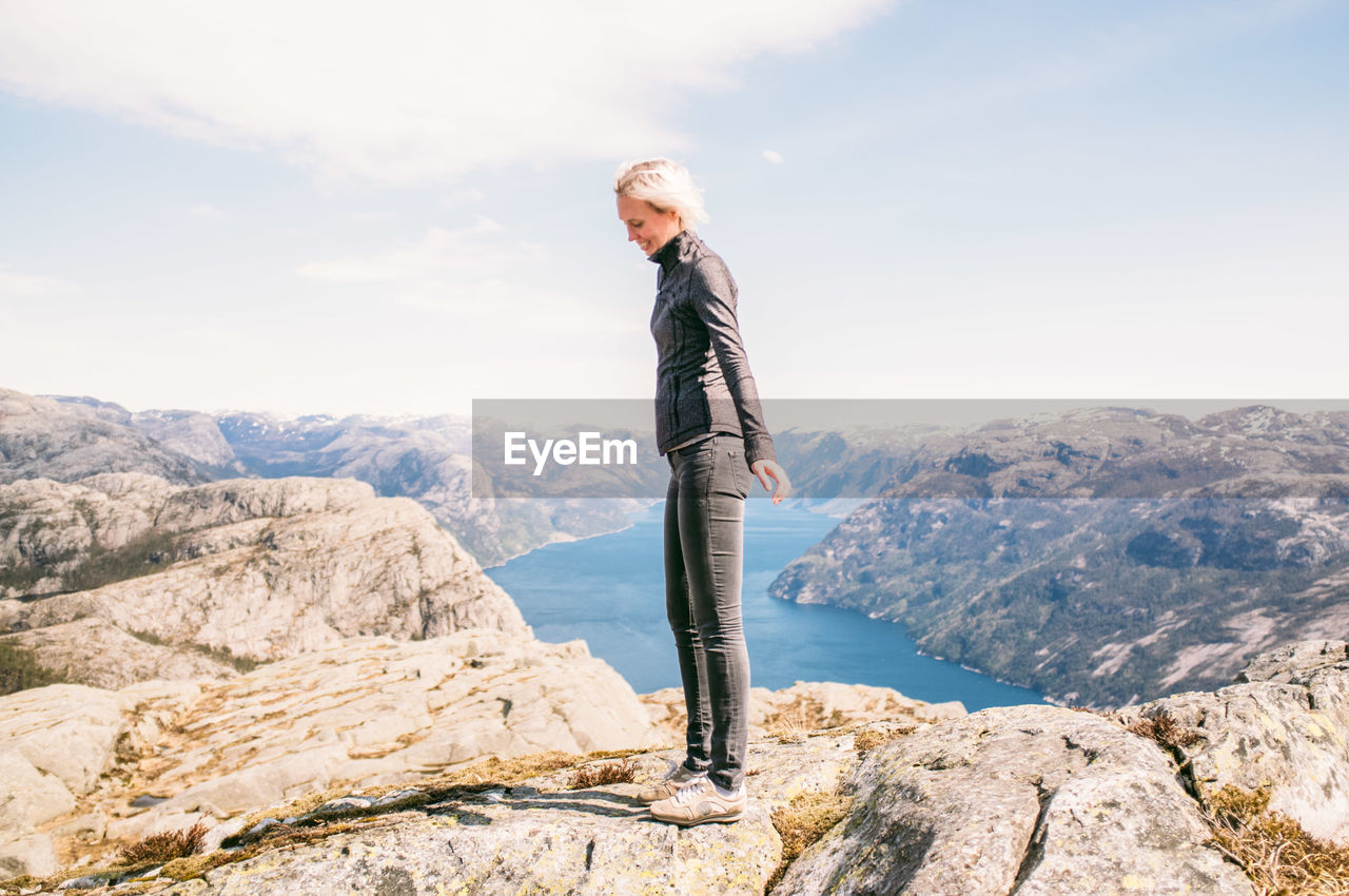 Woman standing on mountain