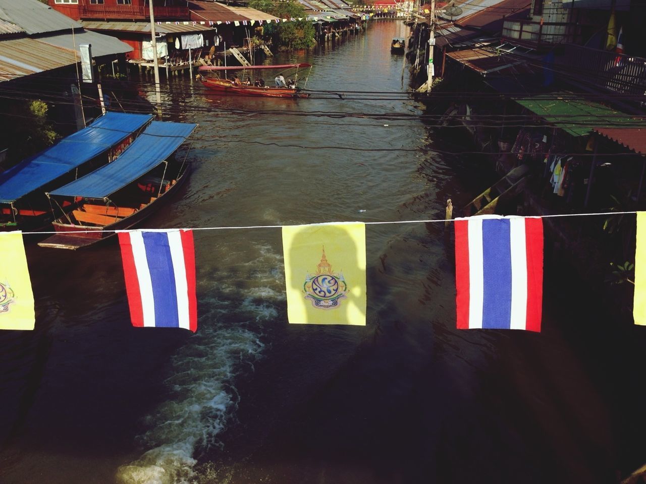 flag, patriotism, hanging, day, outdoors, no people, pride, water, close-up