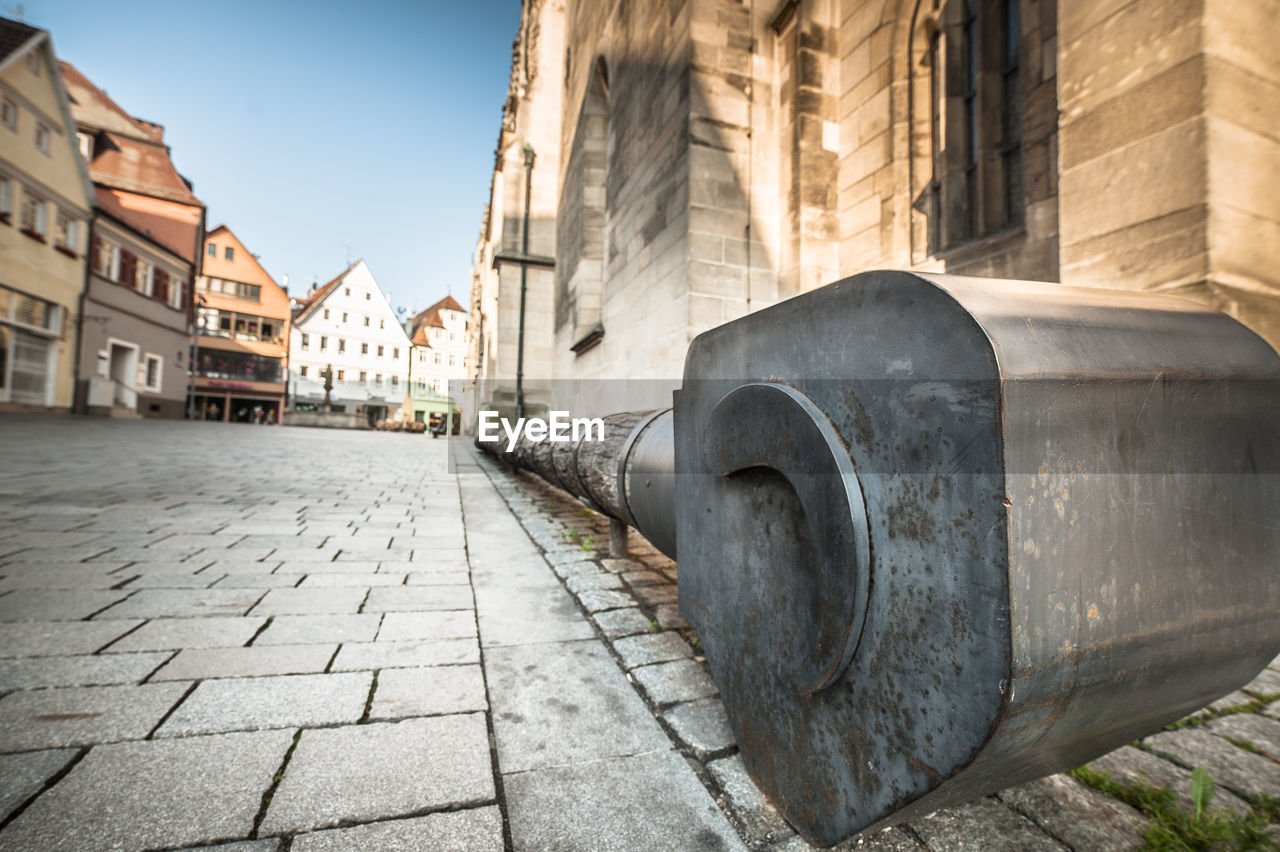 Battering ram in front of medieval church marienkirche in reutlingen