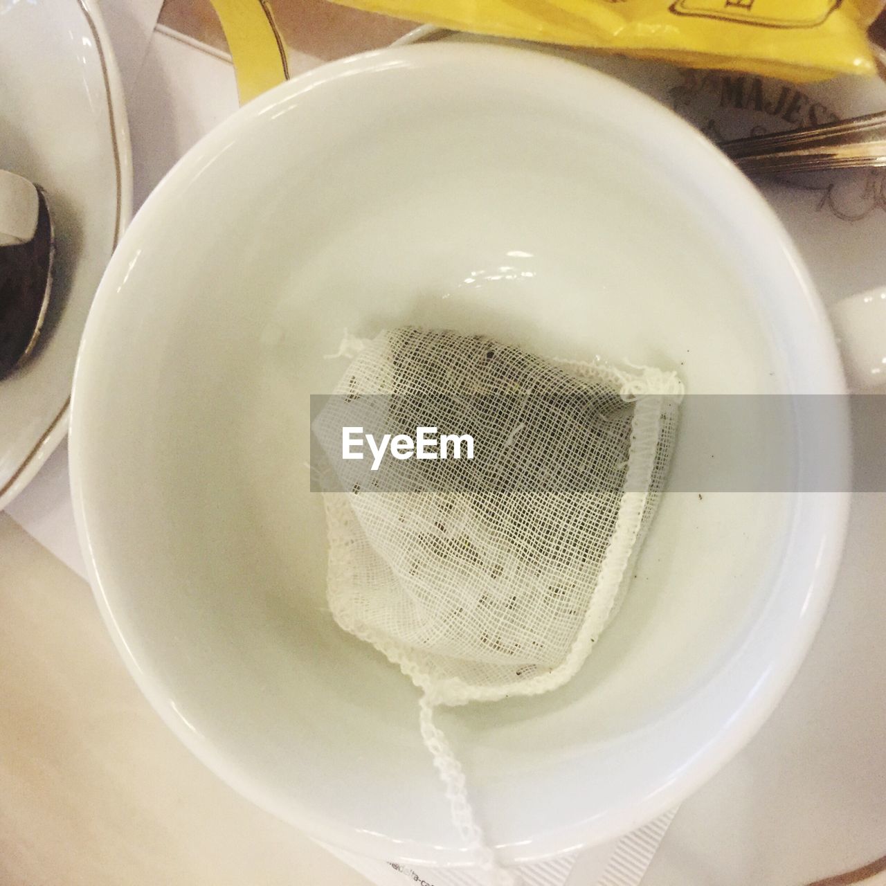 High angle view of teabag in cup on table