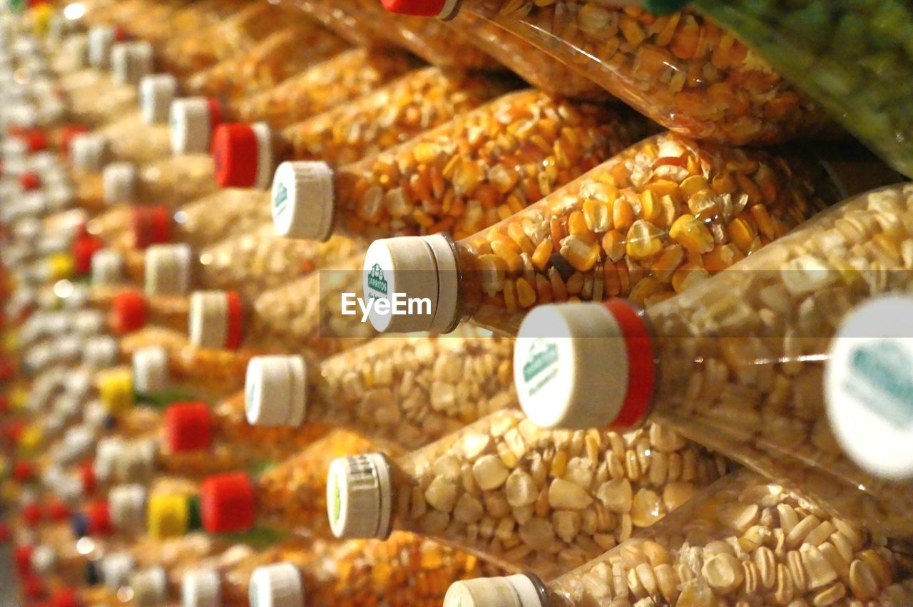 Detail shot of corns in bottles