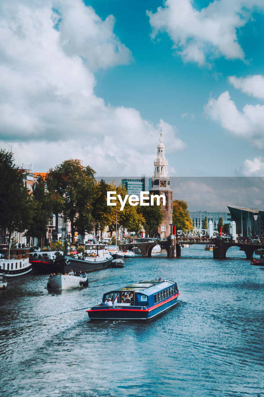  amstel in amsterdam netherlands landmark old european city landscape. picturesque cloudscape