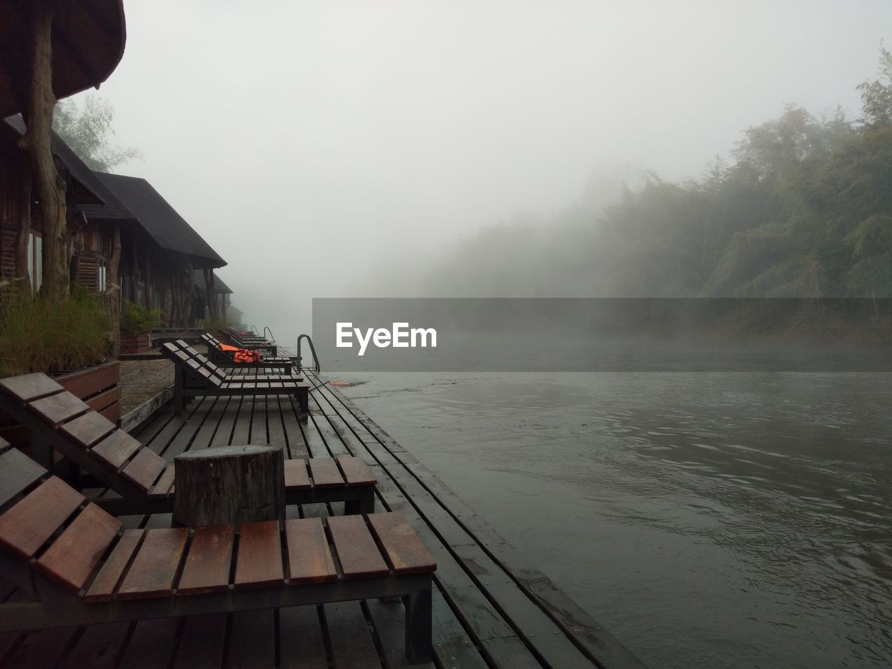 PIER ON LAKE AGAINST SKY