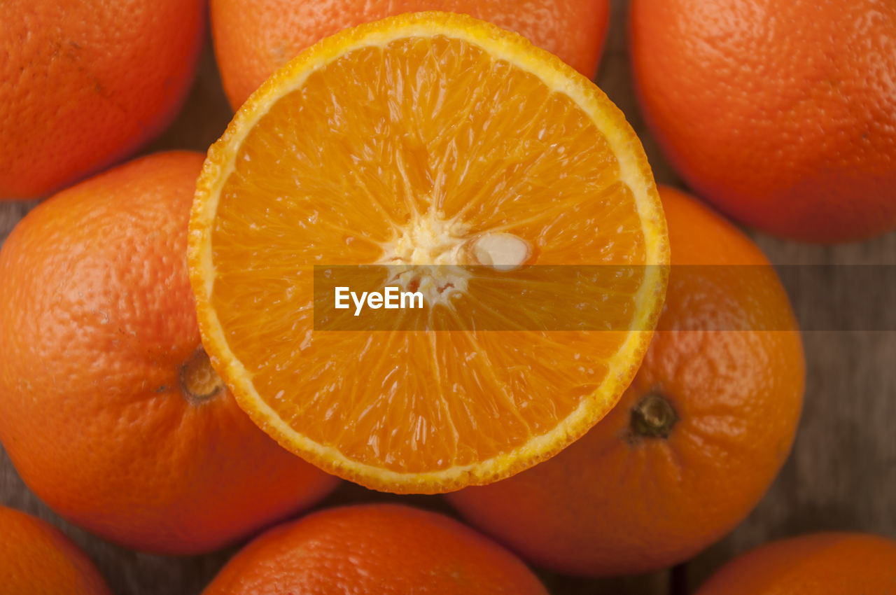 Close-up of fresh oranges on table