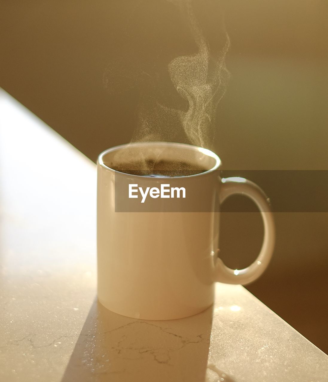 Close-up of coffee cup on table