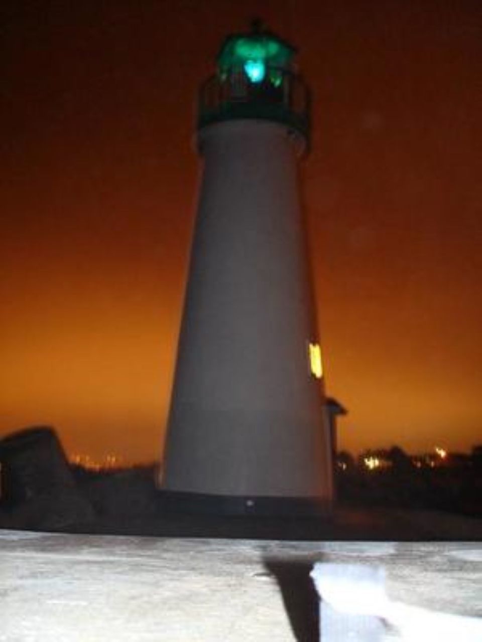 VIEW OF LIGHTHOUSE AT SUNSET