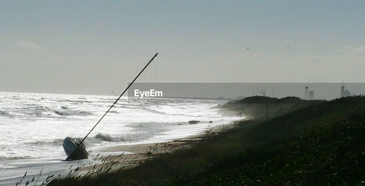 VIEW OF BEACH AGAINST SKY