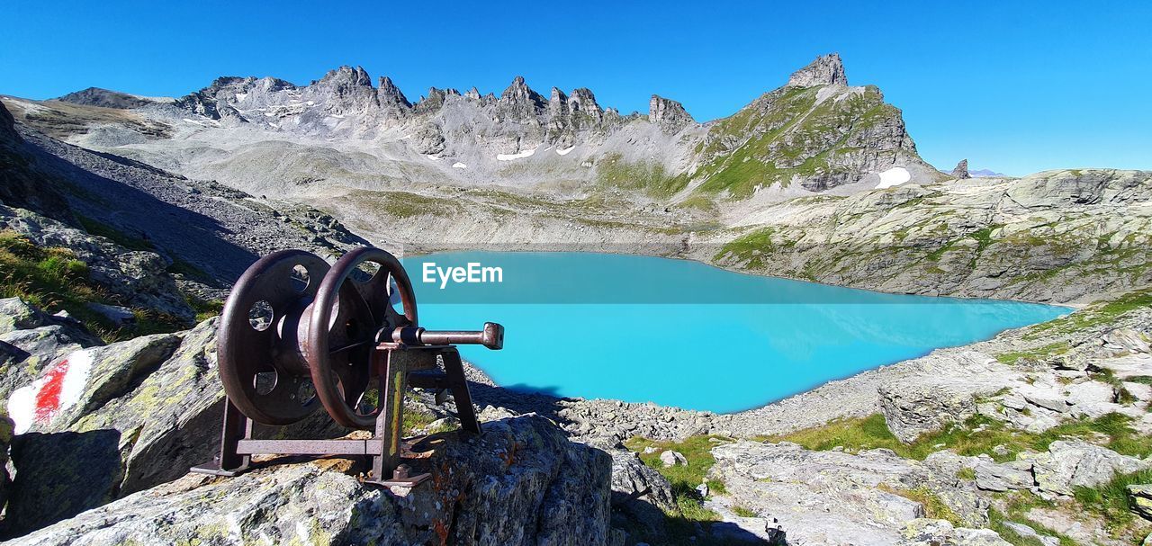 Scenic view of snowcapped mountains against clear sky