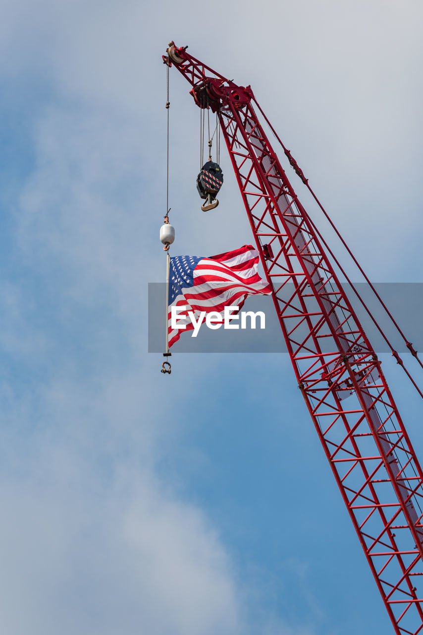 LOW ANGLE VIEW OF FLAG AGAINST SKY