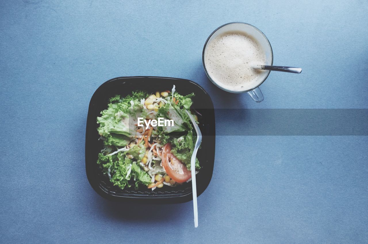 Close up of salad and drink