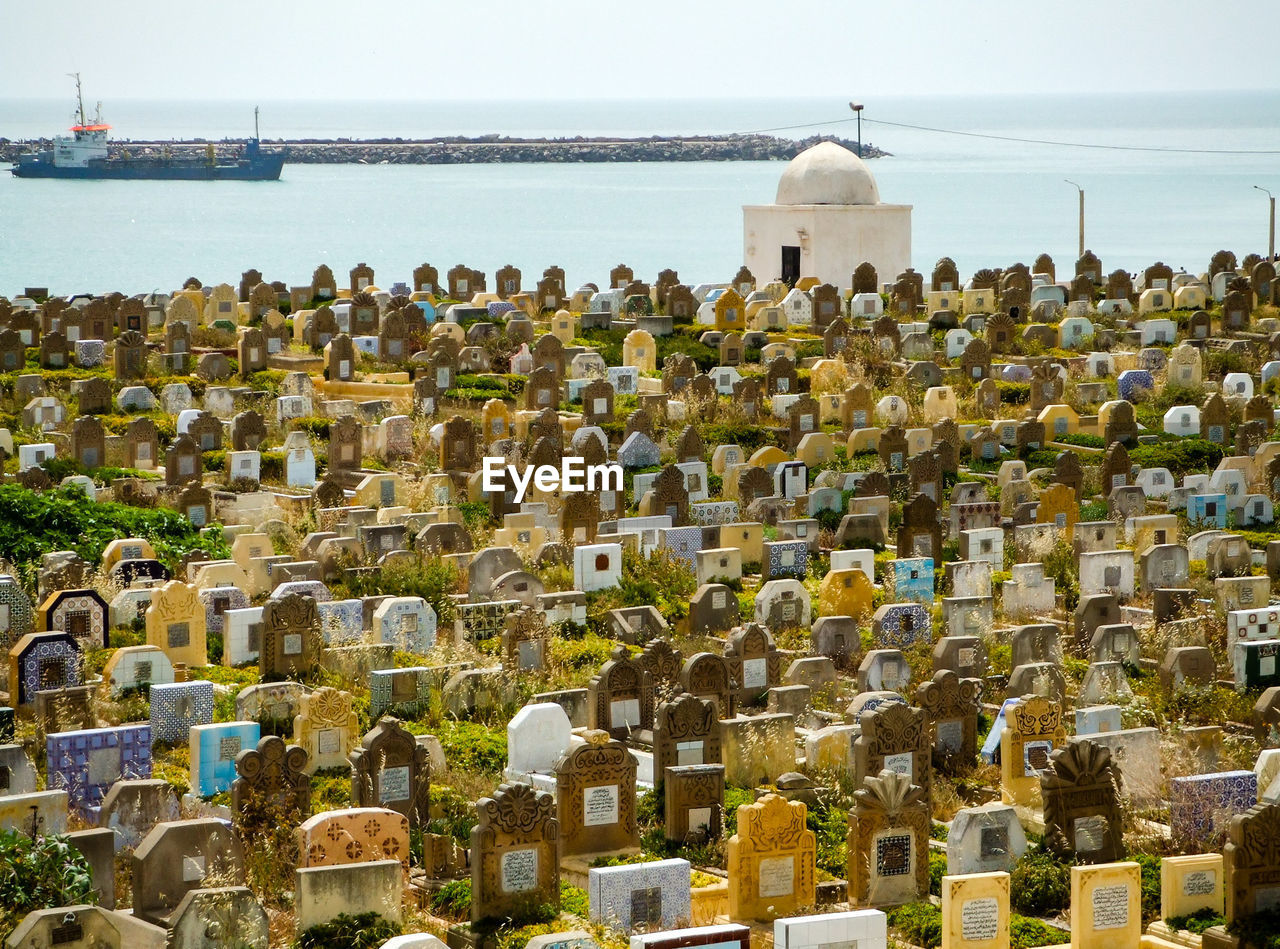Panoramic view of historic cemetery against sky