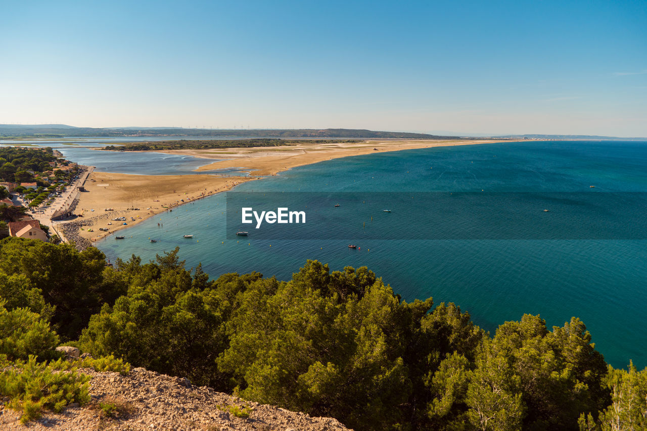 High angle view of calm sea against clear sky