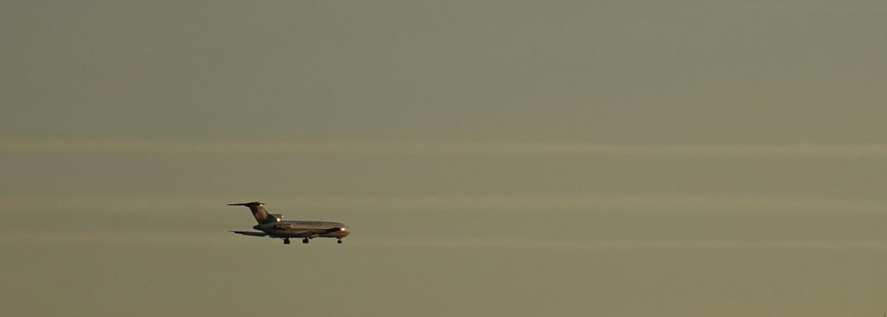 Panoramic view of airplane against sky