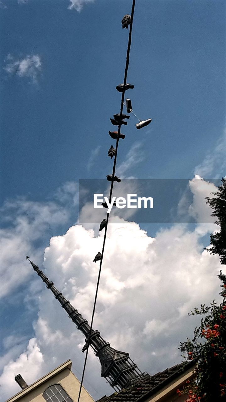 LOW ANGLE VIEW OF ANTENNA AGAINST SKY