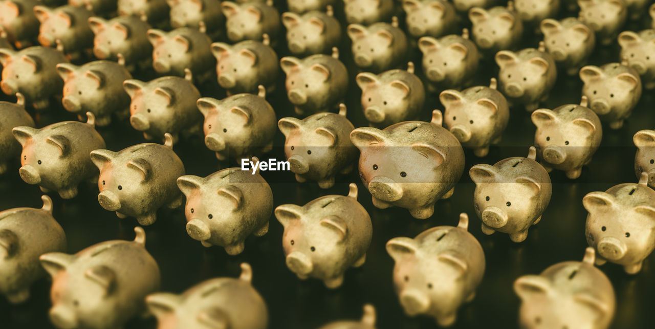 Full frame shot of piggy banks arranged