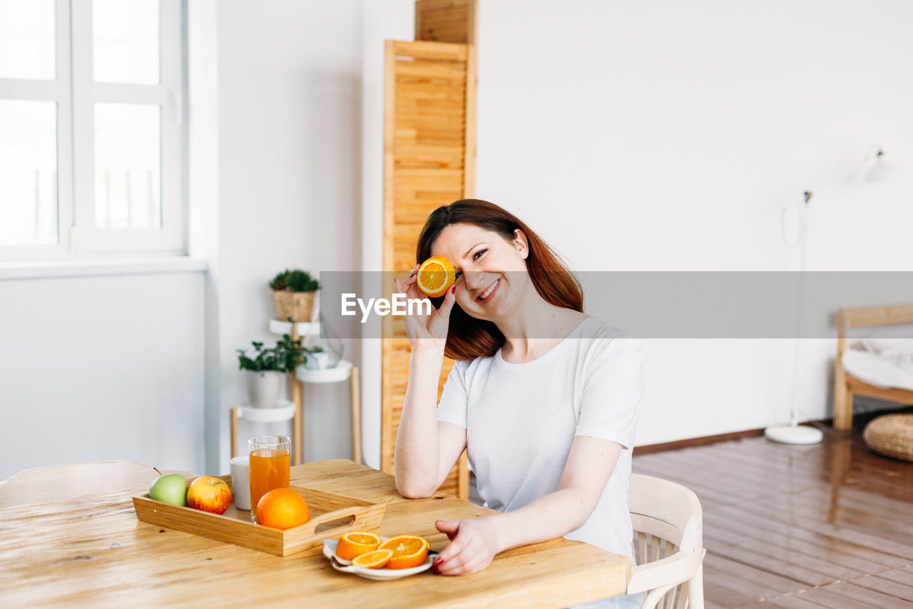 YOUNG WOMAN IN A BOWL