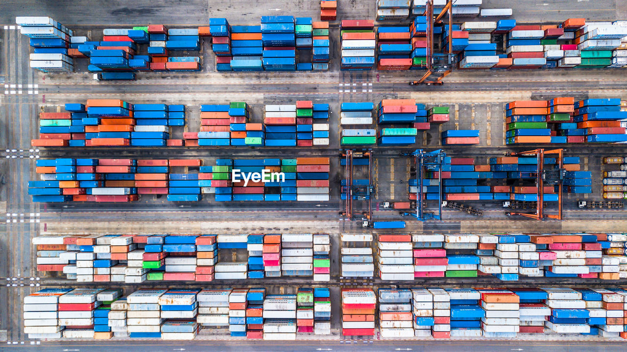 High angle view of container ship at commercial dock