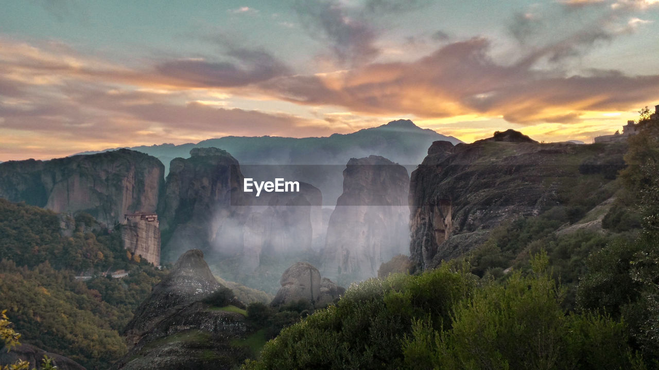 Scenic view of mountains against sky during sunset