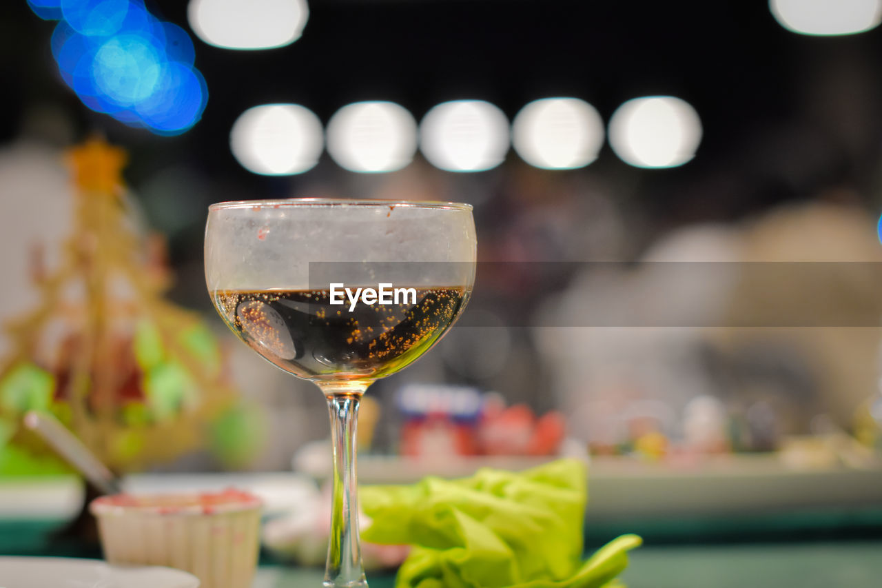 Close-up of wine in glass on table at restaurant