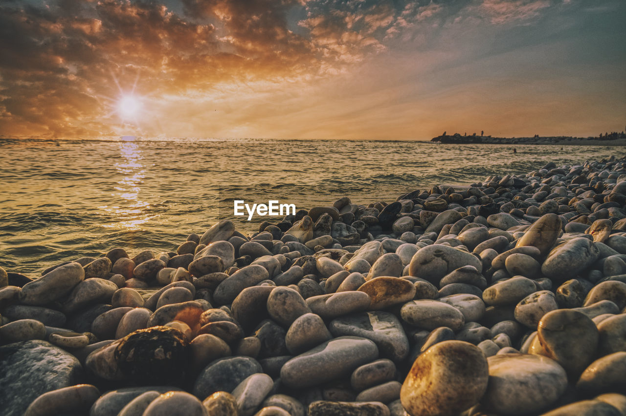 Scenic view of sea against sky during sunset