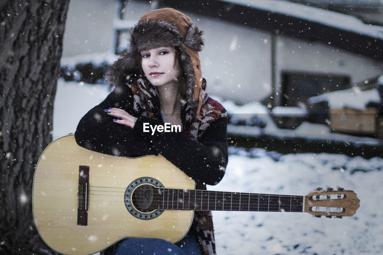 PORTRAIT OF A YOUNG WOMAN WITH SNOW