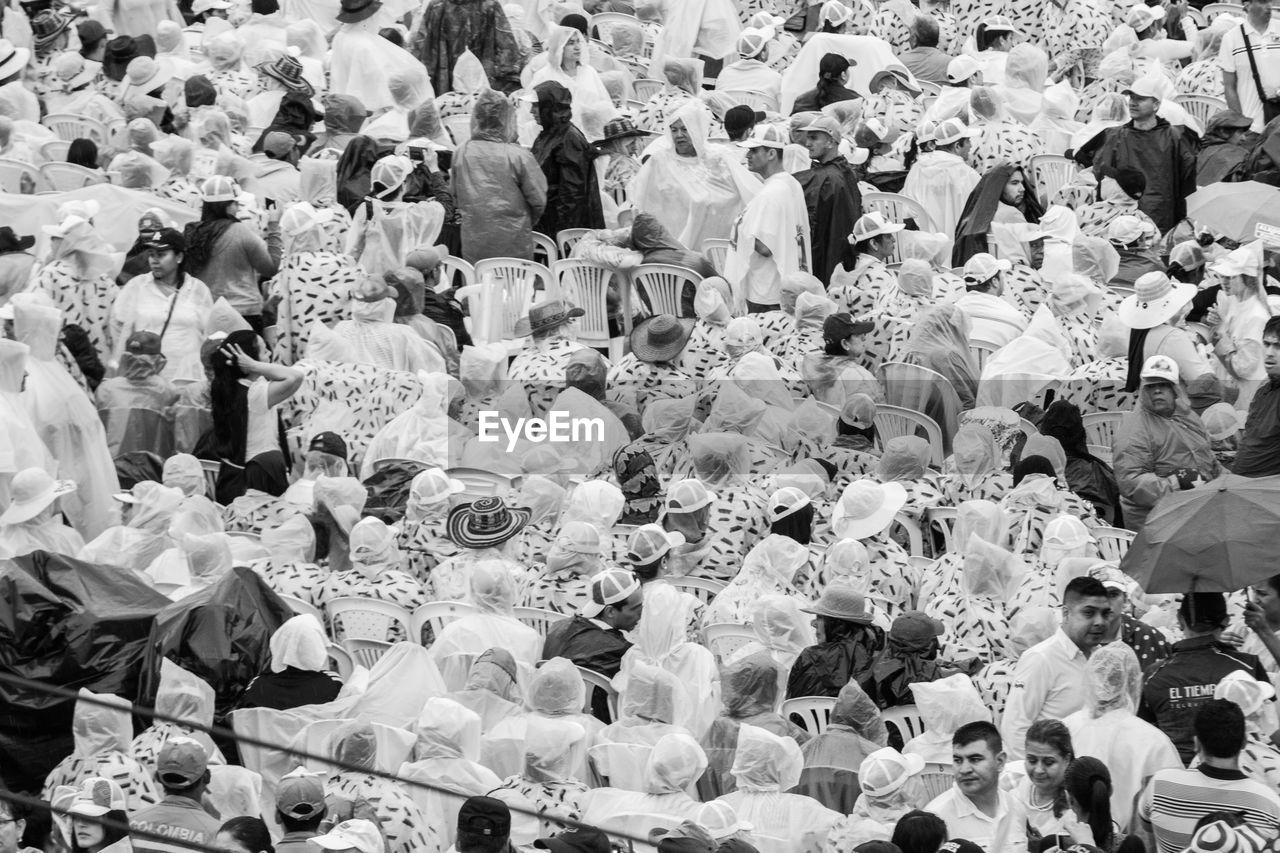 HIGH ANGLE VIEW OF PEOPLE ON FLOOR