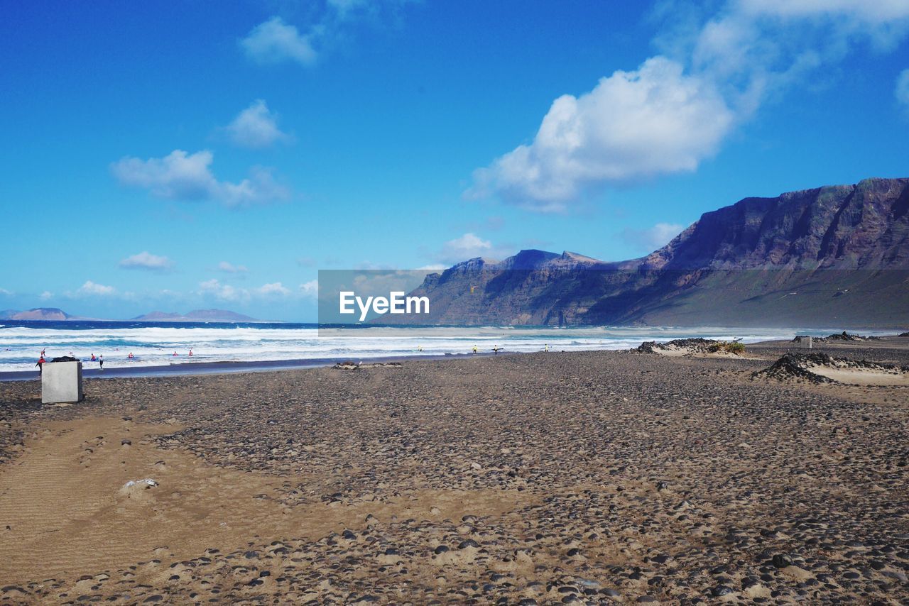 Scenic view of beach against sky