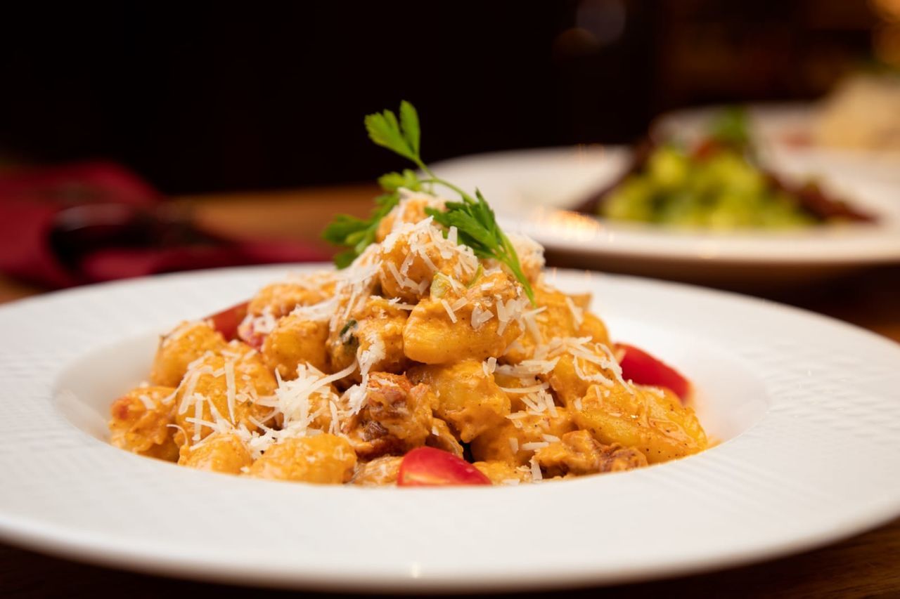 food and drink, food, plate, healthy eating, dish, freshness, wellbeing, meal, cuisine, pasta, vegetable, no people, table, italian food, indoors, rice - food staple, dinner, savory food, close-up, focus on foreground, asian food, thai food, produce, serving size, meat, herb, garnish, business, selective focus, fruit, gourmet, restaurant