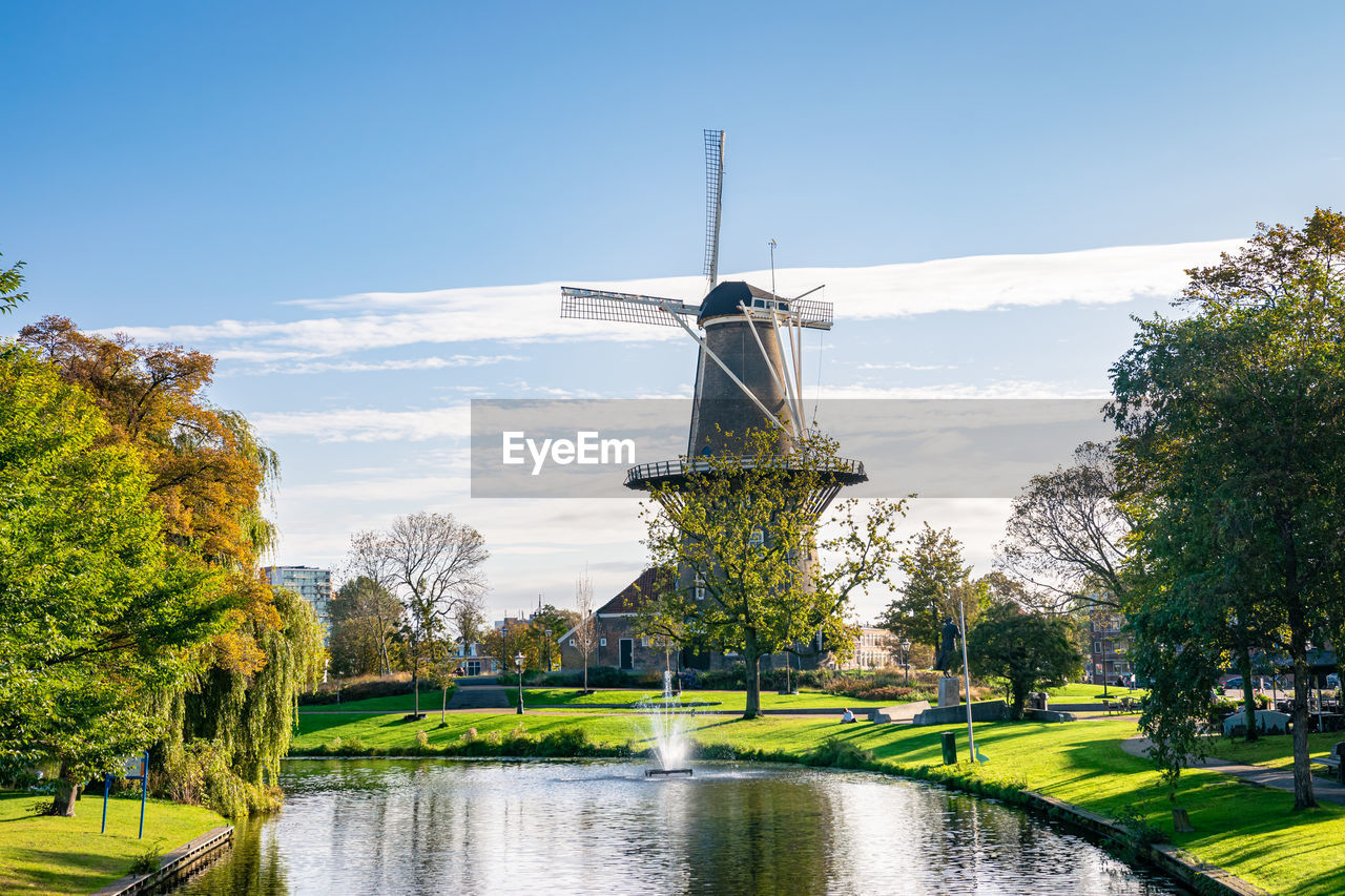 Traditional dutch windmill in a city park