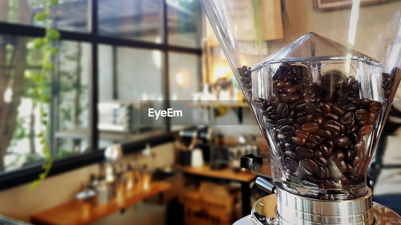 CLOSE-UP OF COFFEE IN GLASS