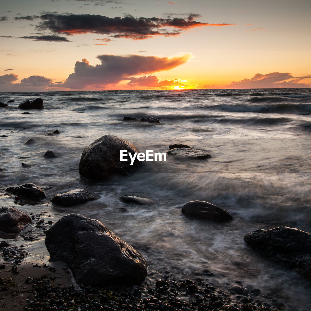 SCENIC VIEW OF SEA DURING SUNSET