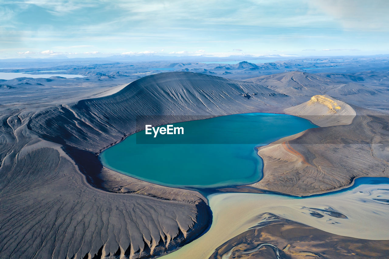 Panoramic view of volcanic landscape against sky