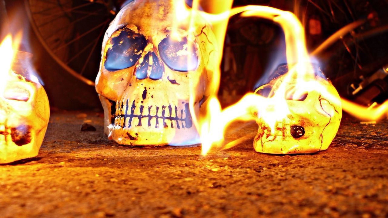 Close-up of burning human skulls