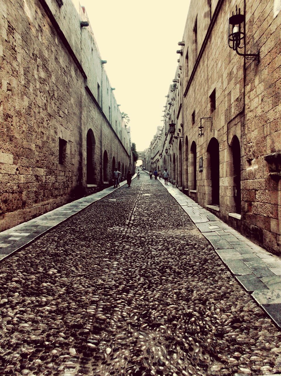 Narrow alley along buildings