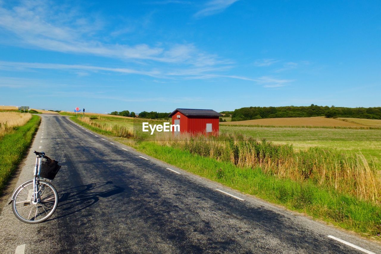 Empty country road along landscape