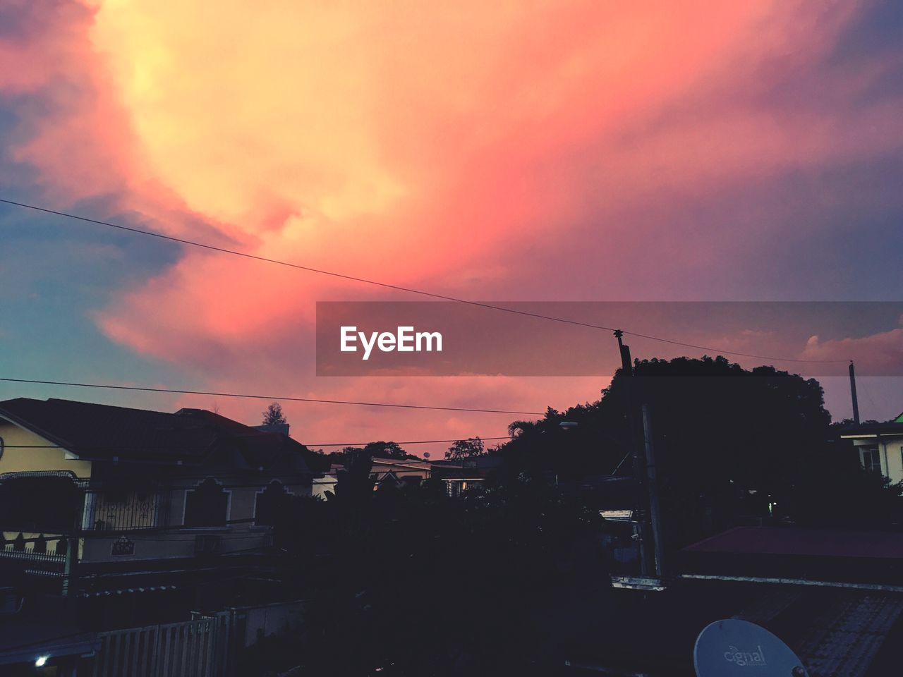 BUILDINGS AGAINST SKY DURING SUNSET