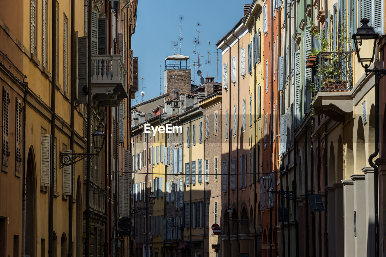 Low angle view of buildings against clear sky