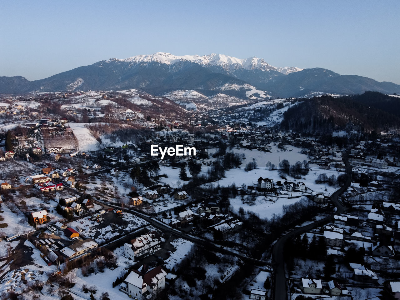 Bucegi mountains seen from the city of bran, romania. beautiful winter landscape. 