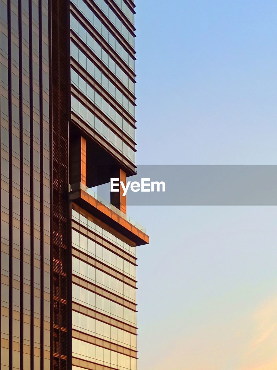 Low angle view of modern building against clear sky