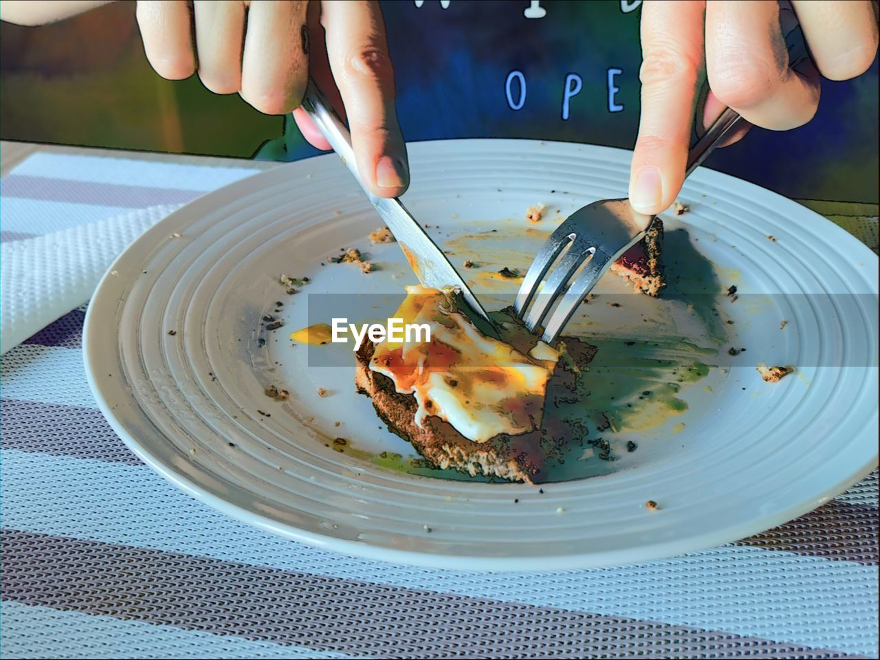 MIDSECTION OF PERSON HOLDING ICE CREAM ON PLATE